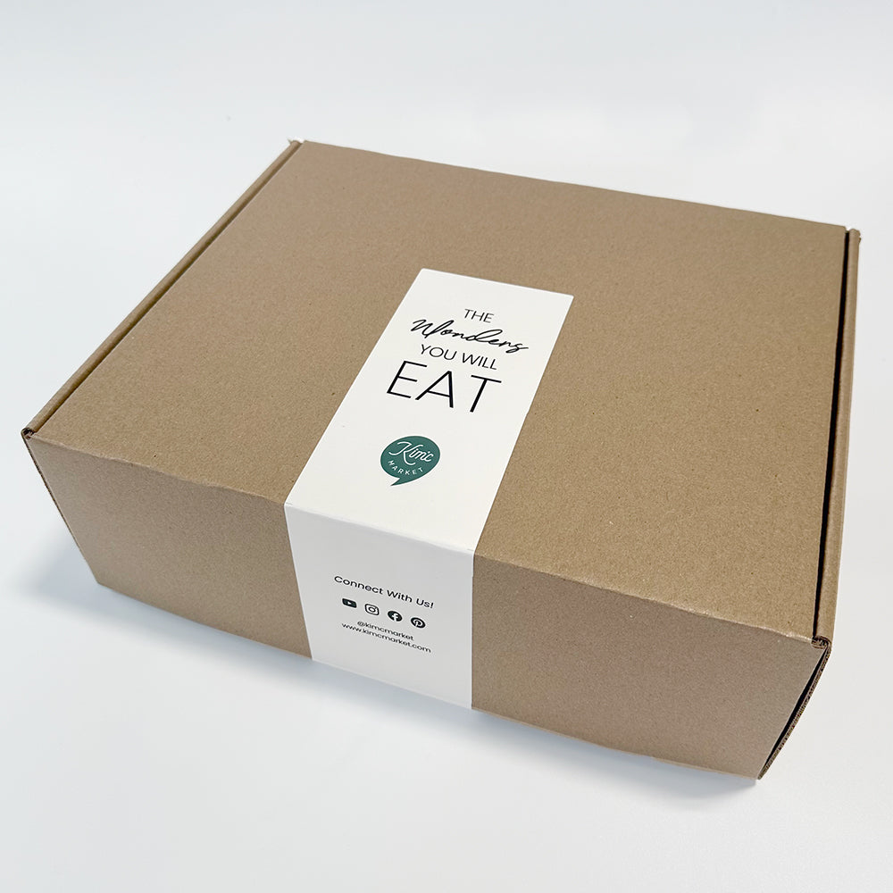 Goyo set gift box shown at an angle with kraft carton and white label panel