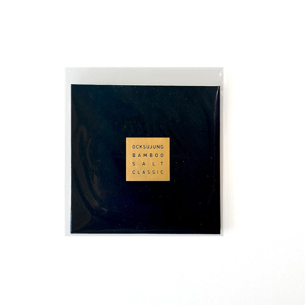 Bamboo salt seasoning packet with dark label and gold text