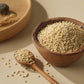 Organic glutinous barley grains in wooden bowl and scoop