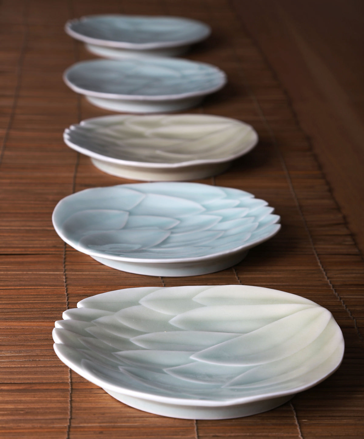 Sky blue lotus-relief dessert plate with glossy leaf petal ridges