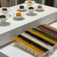 Cube yanggaeng gift set with colorful cube candies in clear tray and white dishes