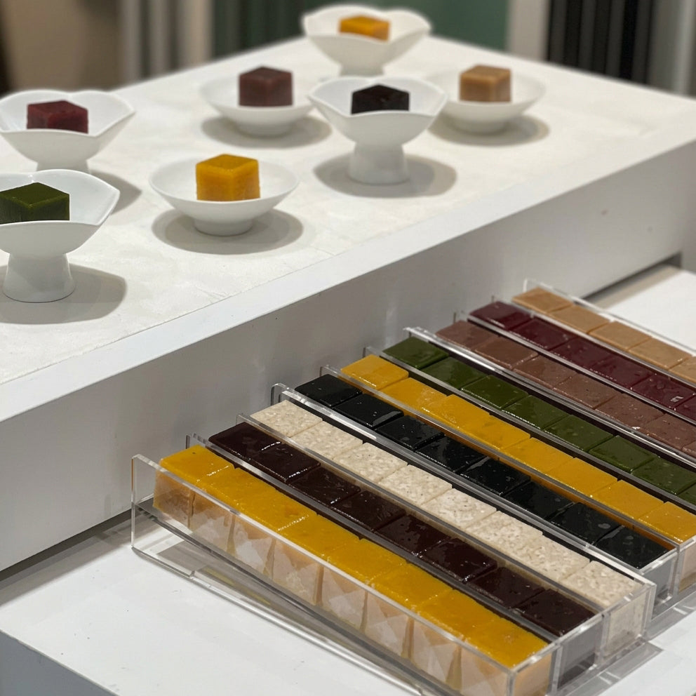 Cube yanggaeng gift set with colorful cube candies in clear tray and white dishes