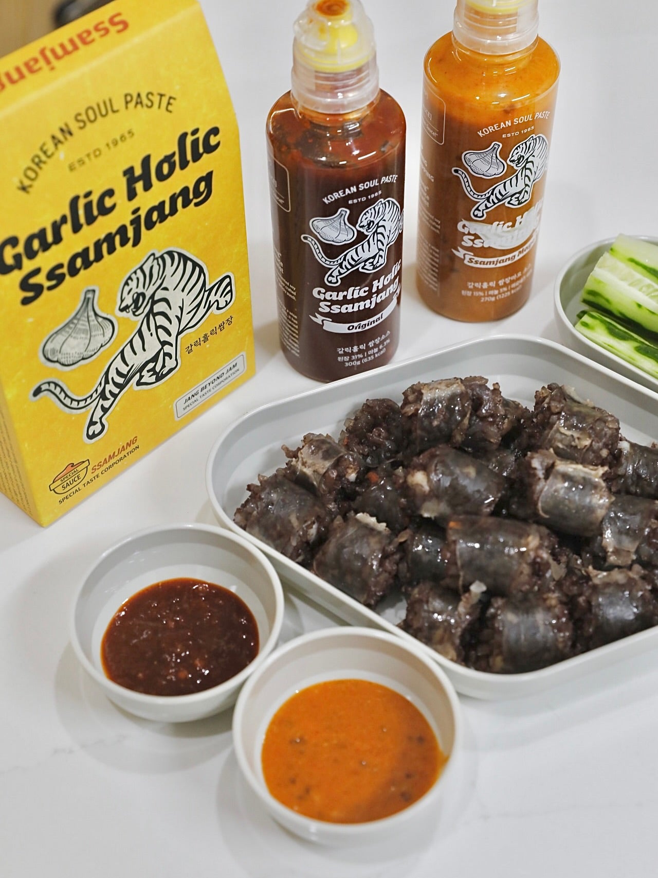 Garlic Holic Ssamjang sauce bottles, Original and Ssamjang Mayo with small dipping cups