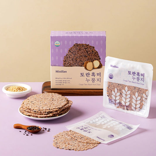 Crispy black rice taro chips with bag, box, and stacked crisps on a plate