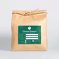 Charm Dream rice bag with green label, kraft paper, tied with twine