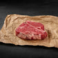 Ribeye steak cut on brown paper