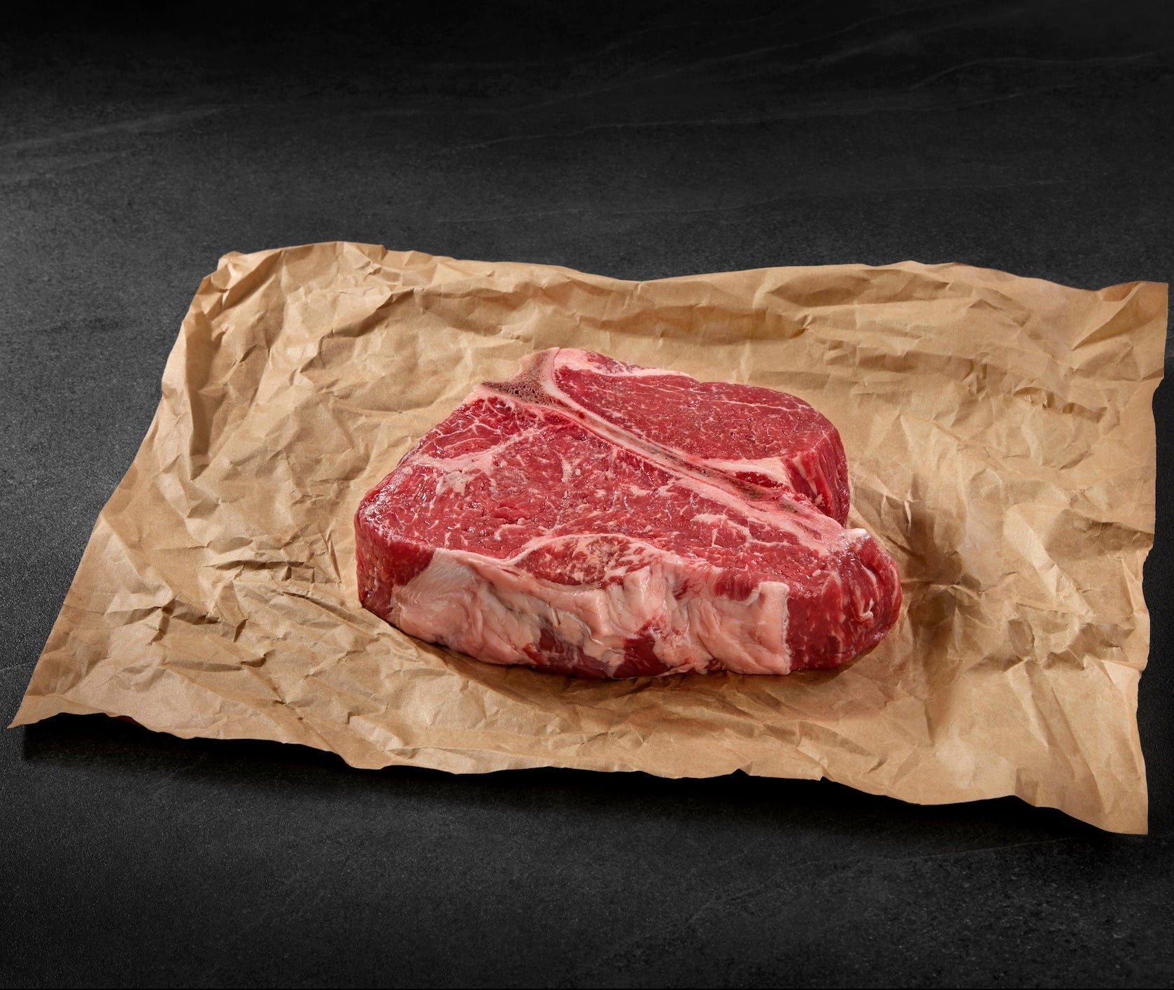 Ribeye steak cut on brown paper