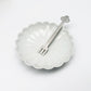 Flower-shaped dessert plate with matching fork, white ceramic