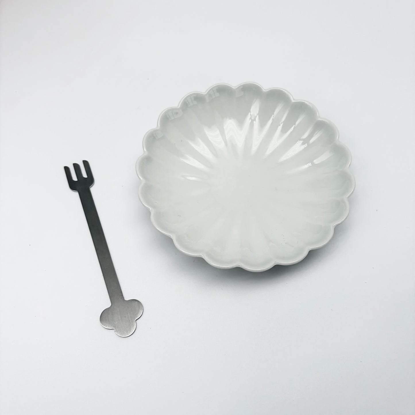 Flower-shaped dessert plate with separate matching fork, white ceramic