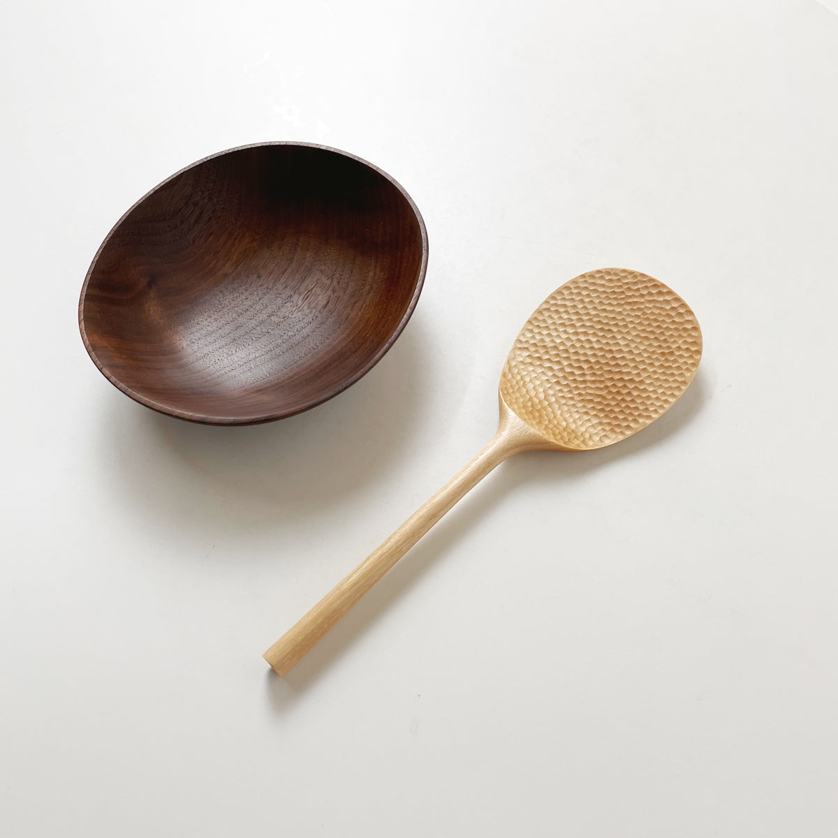 Patterned rice paddle with wooden bowl, light paddle with textured head and long handle