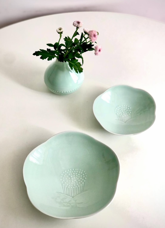 Camellia Flower plate assortment in light mint, round bowls with embossed floral dot details