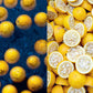 Fresh lemons and lemon slices arranged side by side in two panels