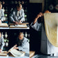 Korean Temple Cooking book spread with chefs working in a traditional kitchen