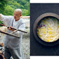Korean Temple Cooking book spread with chef preparing noodles in a pot