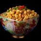 Crispy corn snack in a colorful ceramic bowl with golden crunchy kernels
