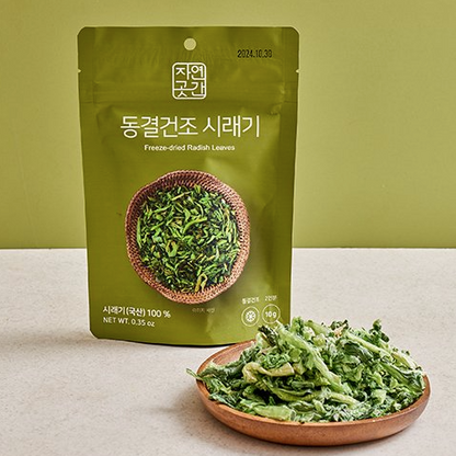 Freeze-dried radish leaves greens namul in a green stand-up pouch with serving bowl