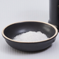 Small bowl of coarse salt for seasoning