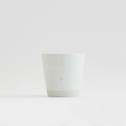Speckled ceramic water cup in light color