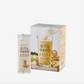 Box and packet of Organic Roasted Multi Grain Powder on a white background