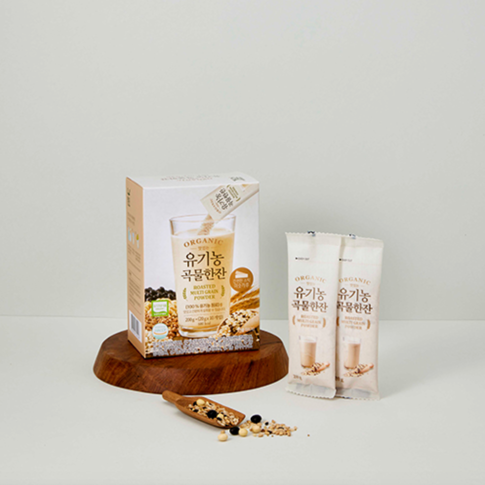Packaging of organic food products on a wooden stand with a white background