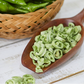 Wooden spoon filled with sliced green Cheongyang chili peppers
