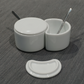 White spice container set with two canisters, spoons, and a spare curved lid