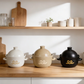 Set of 3 ceramic rice pots with lids—white, beige, and black—owl logo and handles