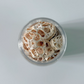 Glass jar of dried lotus root slices, top view