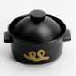 Black rice pot with lid and side handles, gold logo on front