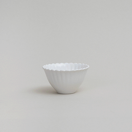 Flower tiny bowl set: small white flower-shaped bowl with a ridged scalloped rim.