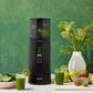 Hurom H400 juicer in black with clear top and front lever