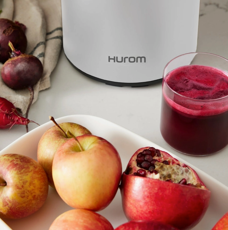 Hurom H400 juicer base, white housing with 'Hurom' logo