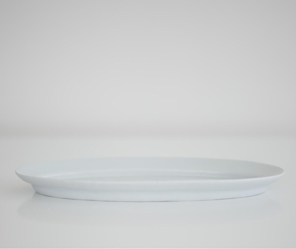 White long oval plate profile with smooth rim and shallow depth