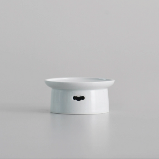 Small ceramic pet bowl with cloud cutout on front