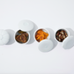 White porcelain lidded containers (set of 4 styles), some lids open