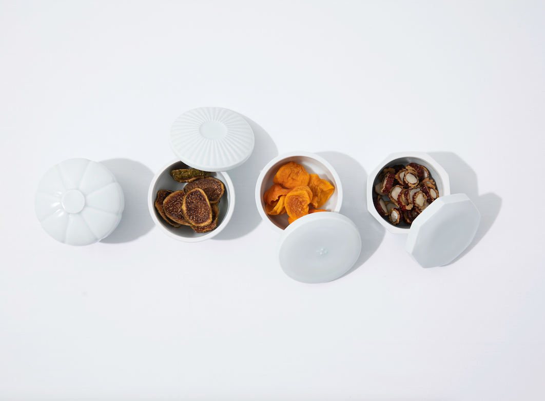 White porcelain lidded containers (set of 4 styles), some lids open