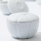 White porcelain lidded container with domed ribbed lid