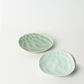 Pair of lotus-pattern dessert plates in sky blue and celadon green