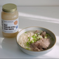 Korean-style beef bone broth set: jar and bowl with rice noodles and beef