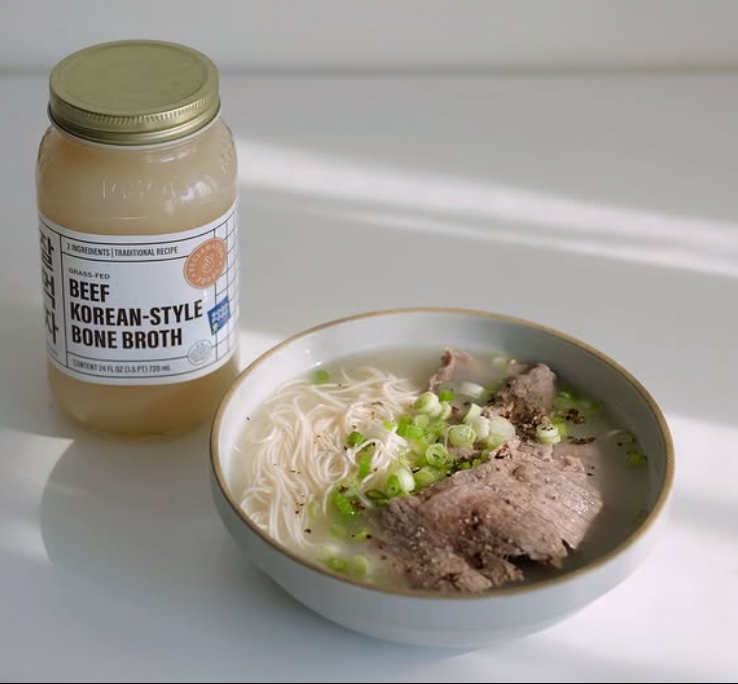 Korean-style beef bone broth set: jar and bowl with rice noodles and beef