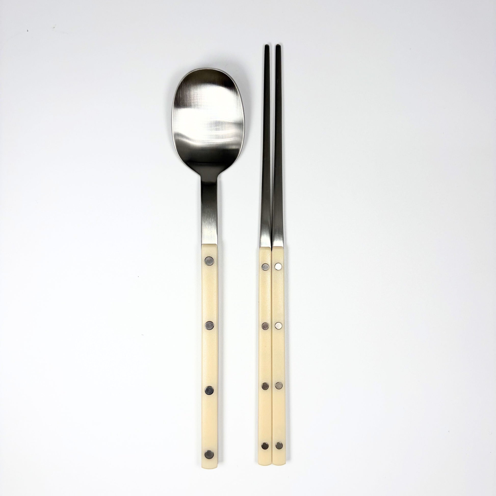 Cutlery set with stainless spoon and chopsticks, light vanilla handles with dot accents