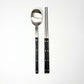Cutlery set with stainless spoon and chopsticks, black handles with dot accents