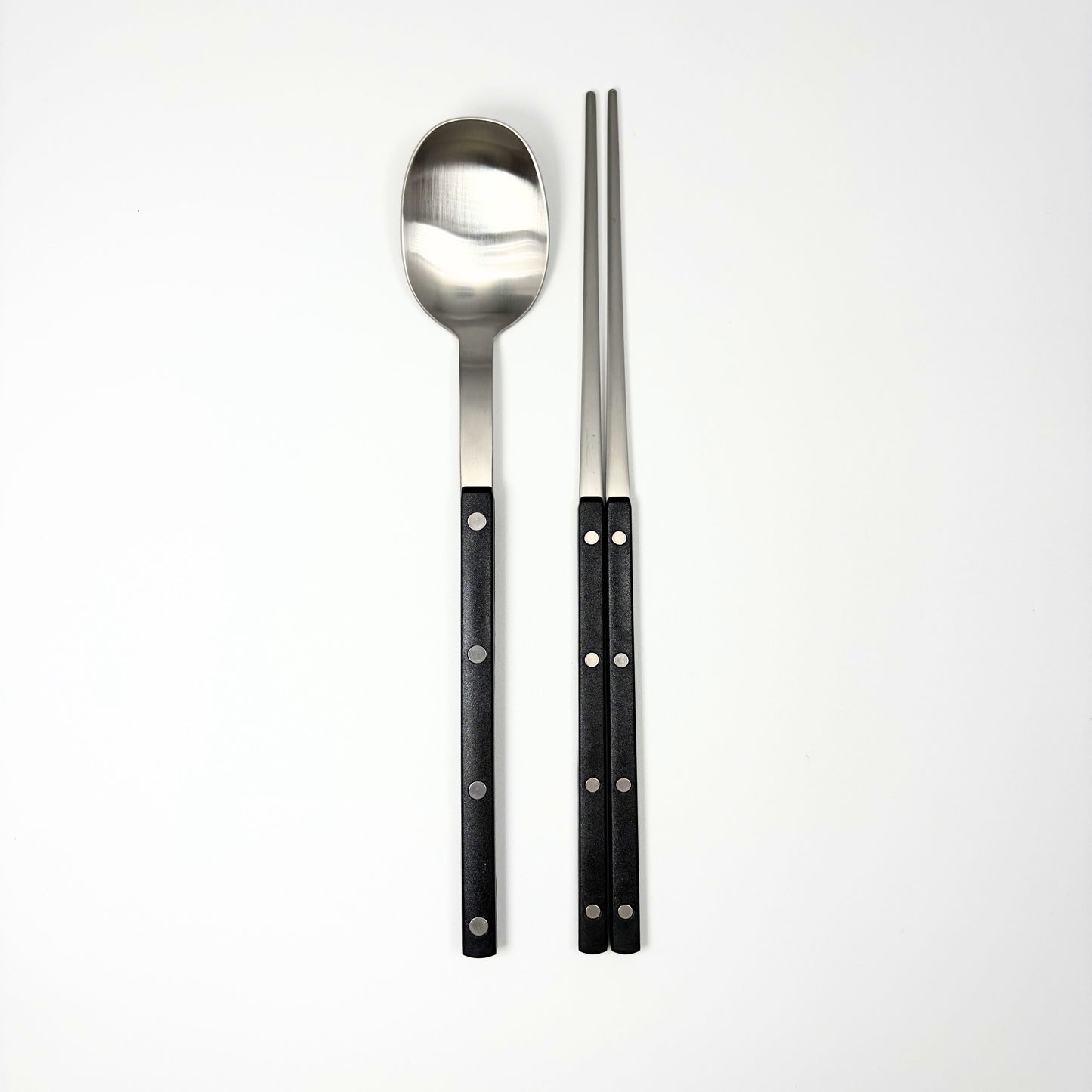 Cutlery set with stainless spoon and chopsticks, black handles with dot accents