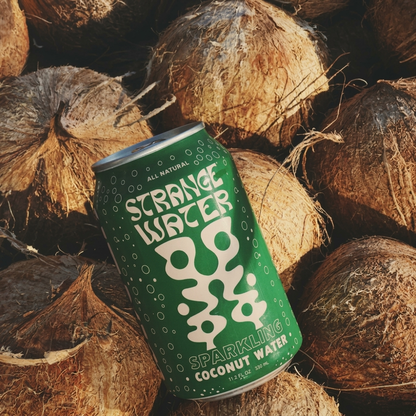 Sparkling coconut water can, green label reading Sparkling Coconut Water