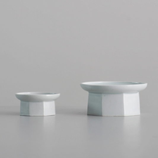 Pair of octagonal soban holders, white tops with light-blue side panels