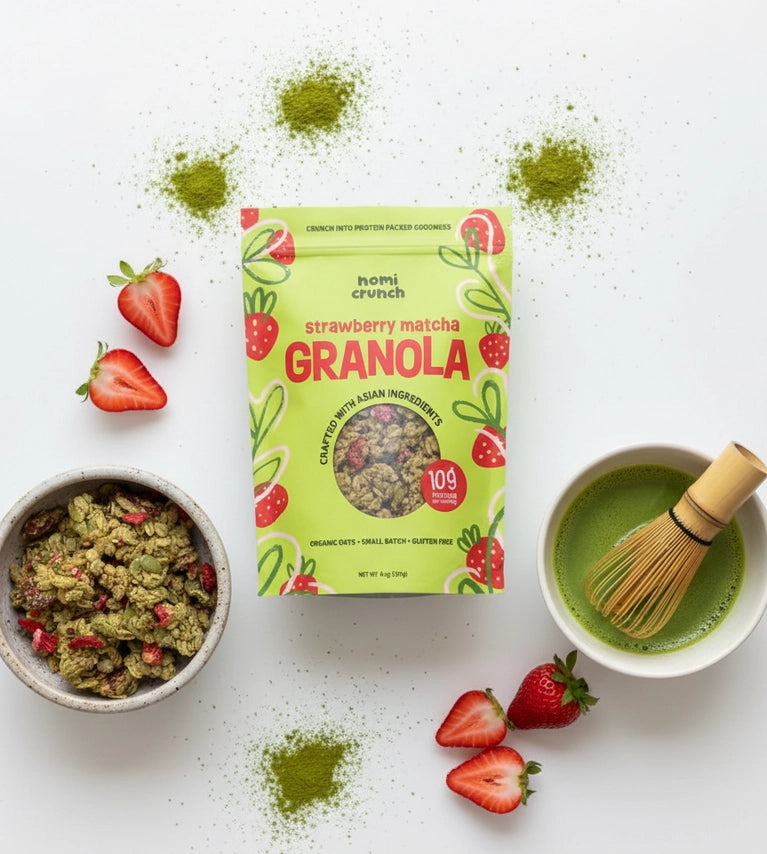Strawberry Matcha granola bag with strawberries, bowl of granola, and green tea